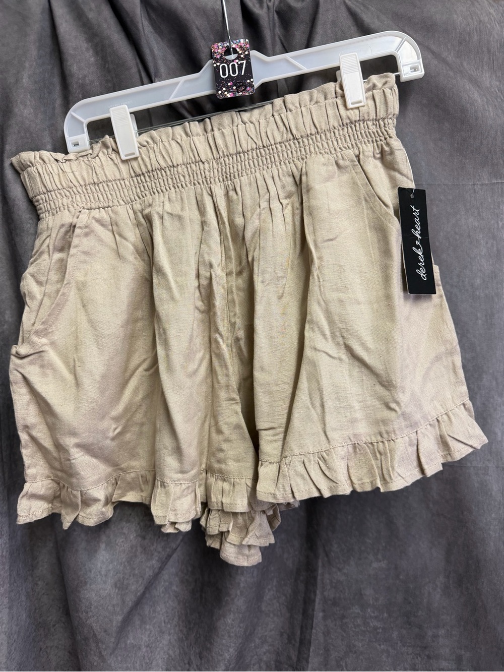 Derek Heart Beige High-Waist Ruffle Hem Shorts